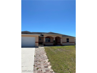 Price Reduced. Welcome to this beautiful 3-bedroom, 2-bath home on Mirror Lakes Golf Club in Florida - for sale on GolfHomes.com, golf home, golf lot