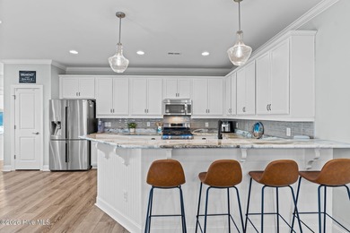 Welcome to resort-style living in this beautifully upgraded on Cape Fear National At Brunswick Forest in North Carolina - for sale on GolfHomes.com, golf home, golf lot