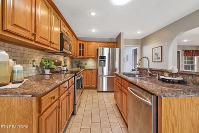 This lovely landscaped home, with irrigation system, is located on Heatherhurst Golf Course in Tennessee - for sale on GolfHomes.com, golf home, golf lot