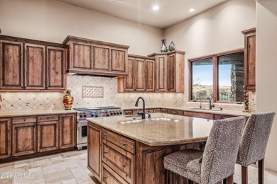 Nestled at the end of a long private drive, this timeless Desert on Desert Mountain Golf Club - Renegade Course in Arizona - for sale on GolfHomes.com, golf home, golf lot