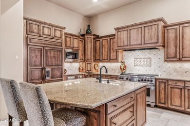 Nestled at the end of a long private drive, this timeless Desert on Desert Mountain Golf Club - Renegade Course in Arizona - for sale on GolfHomes.com, golf home, golf lot