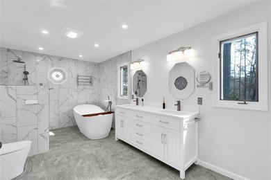 Nestled in the serene lake-community of Keowee Key in Salem on Keowee Key Golf and Country Club in South Carolina - for sale on GolfHomes.com, golf home, golf lot