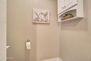 This lovely landscaped home, with irrigation system, is located on Heatherhurst Golf Course in Tennessee - for sale on GolfHomes.com, golf home, golf lot