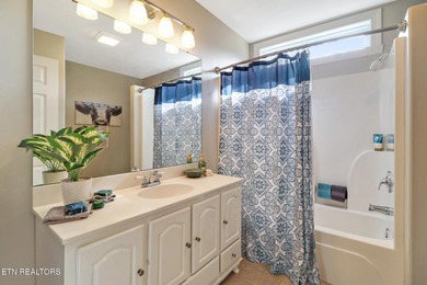 This lovely landscaped home, with irrigation system, is located on Heatherhurst Golf Course in Tennessee - for sale on GolfHomes.com, golf home, golf lot