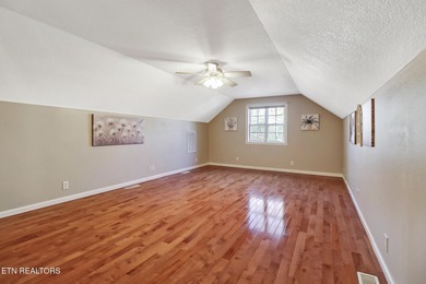 This lovely landscaped home, with irrigation system, is located on Heatherhurst Golf Course in Tennessee - for sale on GolfHomes.com, golf home, golf lot