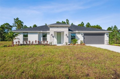 Stunning New Construction Home on Over 1 Acre in Wedgefield

 on Wedgefield Golf Club in Florida - for sale on GolfHomes.com, golf home, golf lot