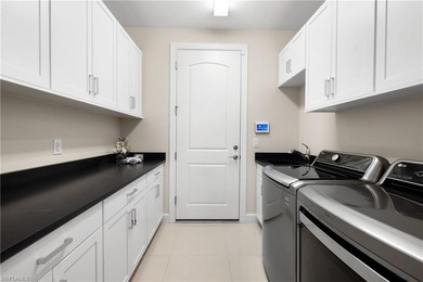 A true showpiece of modern luxury, this one of a kind Pinnacle on Calusa Pines Golf Club in Florida - for sale on GolfHomes.com, golf home, golf lot