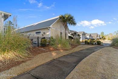 Welcome to resort-style living in this beautifully upgraded on Cape Fear National At Brunswick Forest in North Carolina - for sale on GolfHomes.com, golf home, golf lot