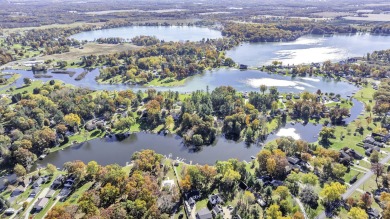 PINEHILL LAKEFRONT 4 BEDROOM HOME WITH 275 FT OF FRONTAGE & 0.88 on Deer Run Golf Club in Michigan - for sale on GolfHomes.com, golf home, golf lot