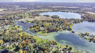 PINEHILL LAKEFRONT 4 BEDROOM HOME WITH 275 FT OF FRONTAGE & 0.88 on Deer Run Golf Club in Michigan - for sale on GolfHomes.com, golf home, golf lot