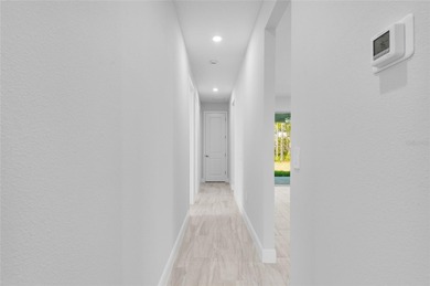 One or more photo(s) has been virtually staged. Stunning New on Wedgefield Golf Club in Florida - for sale on GolfHomes.com, golf home, golf lot