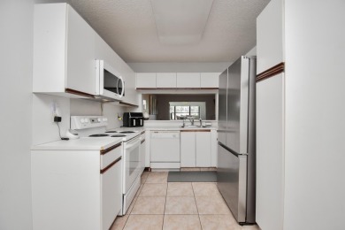 Updated 2 bed 2 bath plus bonus Florida room with closet on Forest Oaks Golf Club in Florida - for sale on GolfHomes.com, golf home, golf lot