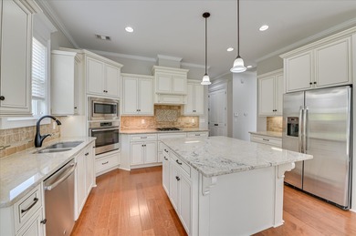 This stunning 2-story home offers the perfect blend of comfort on Bartram Trail Golf Club in Georgia - for sale on GolfHomes.com, golf home, golf lot