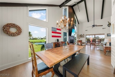 Panoramic lake and golf course views from this elegant island on The Dunes Golf and Tennis Club in Florida - for sale on GolfHomes.com, golf home, golf lot