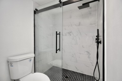 Updated 2 bed 2 bath plus bonus Florida room with closet on Forest Oaks Golf Club in Florida - for sale on GolfHomes.com, golf home, golf lot