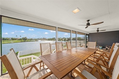 Panoramic lake and golf course views from this elegant island on The Dunes Golf and Tennis Club in Florida - for sale on GolfHomes.com, golf home, golf lot