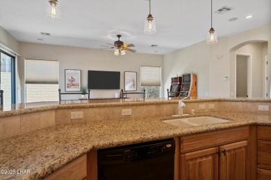Elegant Former Model Home on the 7th Hole in Laughlin Ranch Golf on Laughlin Ranch Golf Club in Arizona - for sale on GolfHomes.com, golf home, golf lot