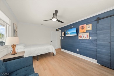 Panoramic lake and golf course views from this elegant island on The Dunes Golf and Tennis Club in Florida - for sale on GolfHomes.com, golf home, golf lot