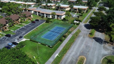 Updated 2 bed 2 bath plus bonus Florida room with closet on Forest Oaks Golf Club in Florida - for sale on GolfHomes.com, golf home, golf lot