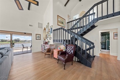 Panoramic lake and golf course views from this elegant island on The Dunes Golf and Tennis Club in Florida - for sale on GolfHomes.com, golf home, golf lot