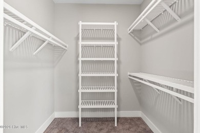 Golf and pond front new construction home is move-in ready in on Lockwood Folly Country Club in North Carolina - for sale on GolfHomes.com, golf home, golf lot