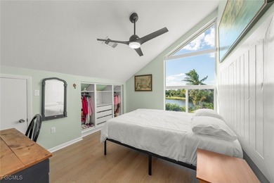 Panoramic lake and golf course views from this elegant island on The Dunes Golf and Tennis Club in Florida - for sale on GolfHomes.com, golf home, golf lot