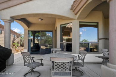 Elegant Former Model Home on the 7th Hole in Laughlin Ranch Golf on Laughlin Ranch Golf Club in Arizona - for sale on GolfHomes.com, golf home, golf lot