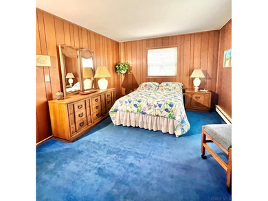 Imagine living in the heart of the Laurel Highlands. Surrounded on Kings Mountain Golf Course in Pennsylvania - for sale on GolfHomes.com, golf home, golf lot