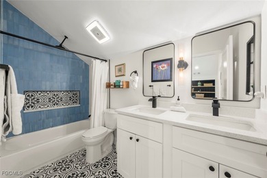 Panoramic lake and golf course views from this elegant island on The Dunes Golf and Tennis Club in Florida - for sale on GolfHomes.com, golf home, golf lot