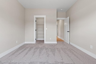 Golf and pond front new construction home is move-in ready in on Lockwood Folly Country Club in North Carolina - for sale on GolfHomes.com, golf home, golf lot