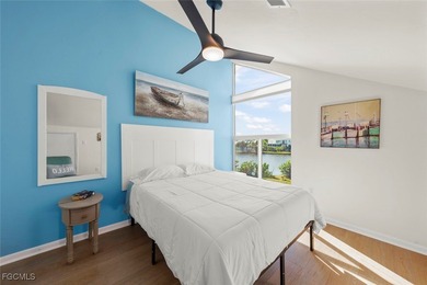 Panoramic lake and golf course views from this elegant island on The Dunes Golf and Tennis Club in Florida - for sale on GolfHomes.com, golf home, golf lot