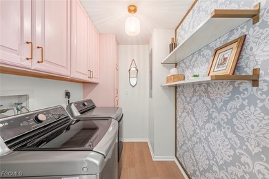 Panoramic lake and golf course views from this elegant island on The Dunes Golf and Tennis Club in Florida - for sale on GolfHomes.com, golf home, golf lot