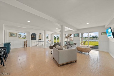 Panoramic lake and golf course views from this elegant island on The Dunes Golf and Tennis Club in Florida - for sale on GolfHomes.com, golf home, golf lot