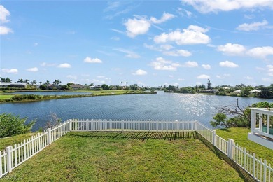 Panoramic lake and golf course views from this elegant island on The Dunes Golf and Tennis Club in Florida - for sale on GolfHomes.com, golf home, golf lot