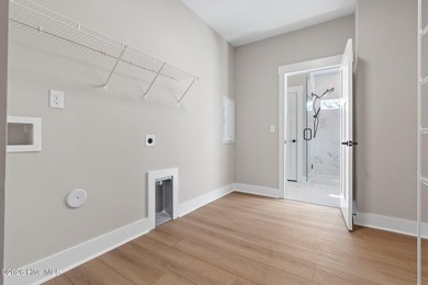 Golf and pond front new construction home is move-in ready in on Lockwood Folly Country Club in North Carolina - for sale on GolfHomes.com, golf home, golf lot