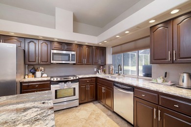 Beautifully updated with idyllic views of the fifteenth hole on Emerald Bay Golf Club in Florida - for sale on GolfHomes.com, golf home, golf lot