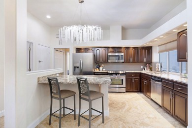 Beautifully updated with idyllic views of the fifteenth hole on Emerald Bay Golf Club in Florida - for sale on GolfHomes.com, golf home, golf lot