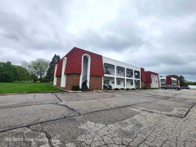 ** Best offer Due By 5/31 at 7 pm * Stunning executive condo on on Swan Valley Golf Club in Michigan - for sale on GolfHomes.com, golf home, golf lot