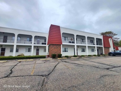 ** Best offer Due By 5/31 at 7 pm * Stunning executive condo on on Swan Valley Golf Club in Michigan - for sale on GolfHomes.com, golf home, golf lot