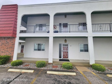 ** Best offer Due By 5/31 at 7 pm * Stunning executive condo on on Swan Valley Golf Club in Michigan - for sale on GolfHomes.com, golf home, golf lot