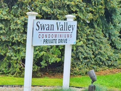 ** Best offer Due By 5/31 at 7 pm * Stunning executive condo on on Swan Valley Golf Club in Michigan - for sale on GolfHomes.com, golf home, golf lot
