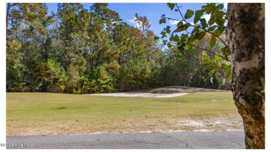 Nestled on the picturesque golf course in the prestigious Rivers on Rivers Edge Golf Club in North Carolina - for sale on GolfHomes.com, golf home, golf lot