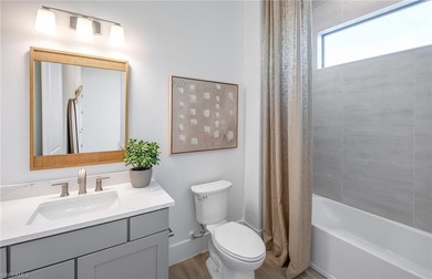 BRAND NEW CONSTRUCTION - Move in by end of December 2025! This on Naples National Golf Club in Florida - for sale on GolfHomes.com, golf home, golf lot