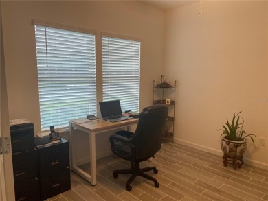 Step into modern comfort in this stunning 3-bedroom, 2-bathroom on Candler Hills Golf and Country Club in Florida - for sale on GolfHomes.com, golf home, golf lot