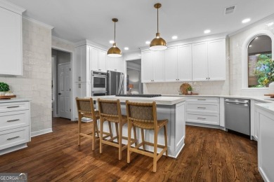 Nestled in the heart of Alpharetta this renovated home in on The Golf Club of Georgia in Georgia - for sale on GolfHomes.com, golf home, golf lot