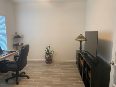 Step into modern comfort in this stunning 3-bedroom, 2-bathroom on Candler Hills Golf and Country Club in Florida - for sale on GolfHomes.com, golf home, golf lot