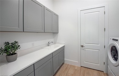 BRAND NEW CONSTRUCTION - Move in by end of December 2025! This on Naples National Golf Club in Florida - for sale on GolfHomes.com, golf home, golf lot