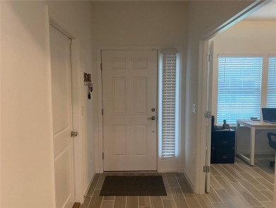 Step into modern comfort in this stunning 3-bedroom, 2-bathroom on Candler Hills Golf and Country Club in Florida - for sale on GolfHomes.com, golf home, golf lot
