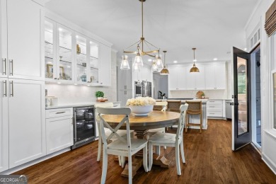 Nestled in the heart of Alpharetta this renovated home in on The Golf Club of Georgia in Georgia - for sale on GolfHomes.com, golf home, golf lot