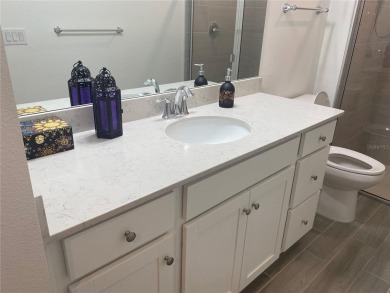 Step into modern comfort in this stunning 3-bedroom, 2-bathroom on Candler Hills Golf and Country Club in Florida - for sale on GolfHomes.com, golf home, golf lot